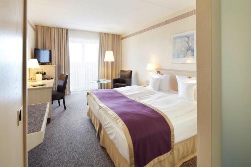 Postel nebo postele na pokoji v ubytování Best Western Hotel Helmstedt am Lappwald