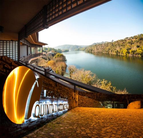 a view of a river from the side of a building at Hotel Rural Quinta da Conchada in Aguieira
