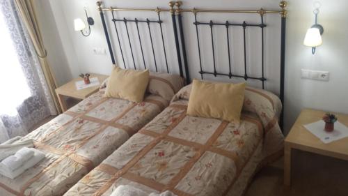 Ein Bett oder Betten in einem Zimmer der Unterkunft Casa Rural Ca'l Gonzalo