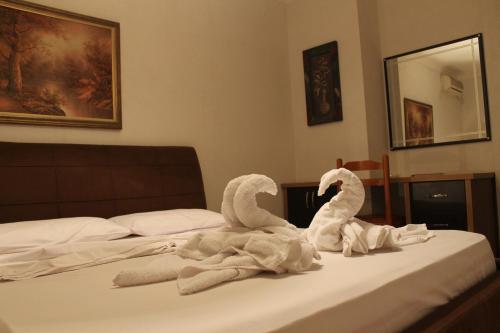 Voodi või voodid majutusasutuse Hotel Livia toas