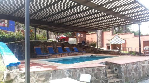 Bazén v ubytování Hotel Casa Valle nebo v jeho okolí