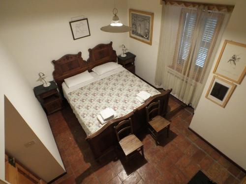 A bed or beds in a room at Mulino Della Ricavata