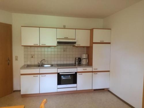 Kuchyň nebo kuchyňský kout v ubytování Apartment Knablhof