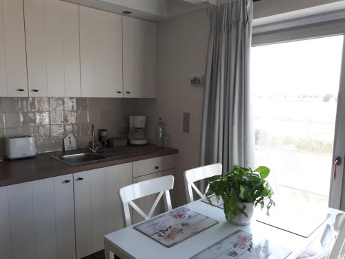 Una cocina o cocineta en B&B 't Hoveke