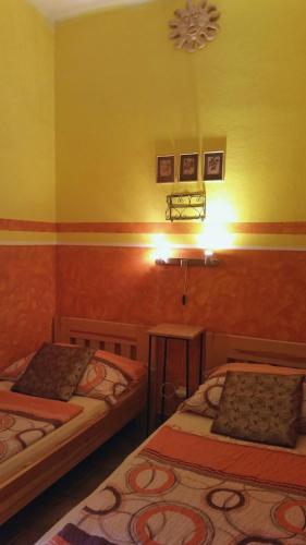 Postel nebo postele na pokoji v ubytování Hostel Merlin