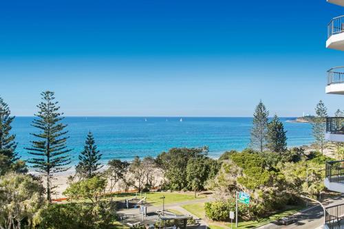 a view of the beach from the balcony of a building at Breeze Mooloolaba, Ascend Hotel Collection in Mooloolaba