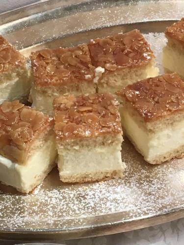a group of desserts on a silver plate at Garni Franca b&b in Selva di Val Gardena