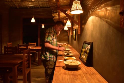 En restaurant eller et spisested på Lizard Safari Lodge