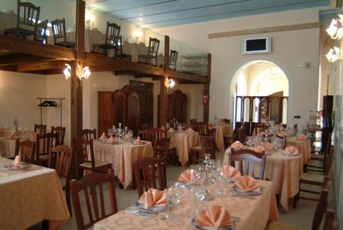 Reštaurácia alebo iné gastronomické zariadenie v ubytovaní B & B Dei Nobili