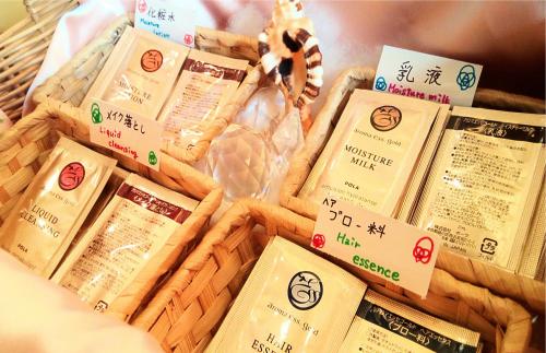 a basket full of food with signs on it at Hotel Sun Queen in Naha