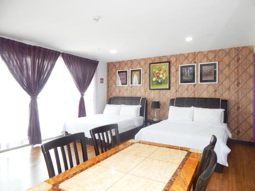 Katil atau katil-katil dalam bilik di Wadi Iman Guesthouse @ i-City