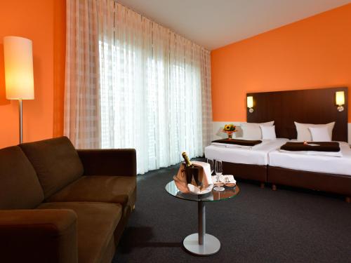 Cama o camas de una habitación en Best Western Plus Konrad Zuse Hotel
