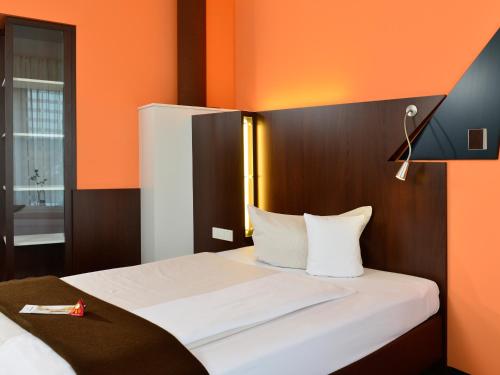 Cama o camas de una habitación en Best Western Plus Konrad Zuse Hotel