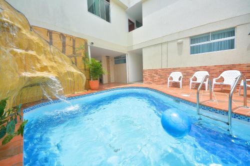 The swimming pool at or close to Hotel Getsemaní BGA