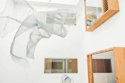 a picture of smoke coming out of a mirror at Boutique-Hotel Zur alten Post in Büsum