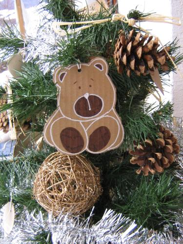 a teddy bear ornament on a christmas tree at Breckenbreck monolocale CIN IT7001C2P4NVWOPA in Allein