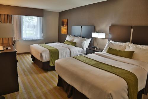 Ліжко або ліжка в номері Best Western Harvest Inn & Suites