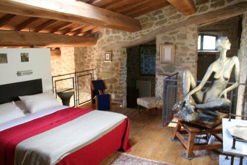 Ένα ή περισσότερα κρεβάτια σε δωμάτιο στο Casale Monticchio