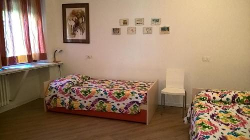 Katil atau katil-katil dalam bilik di Appartamento Venezia Lido