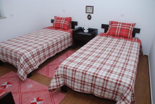 Ένα ή περισσότερα κρεβάτια σε δωμάτιο στο Casas do Monte