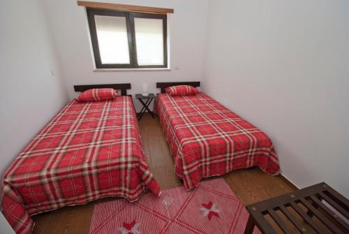 Ένα ή περισσότερα κρεβάτια σε δωμάτιο στο Casas do Monte