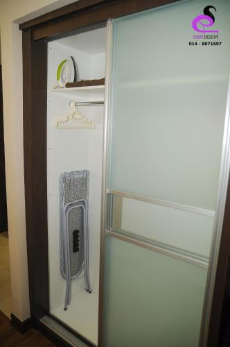 a glass refrigerator with a fan inside of it at Studio Exclusive (Kota Bharu City Point) in Kota Bharu