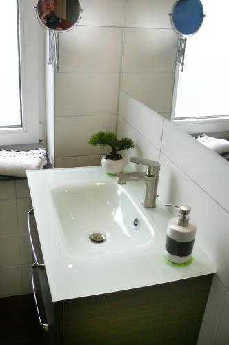 Ένα μπάνιο στο Ferienwohnung Stuermer