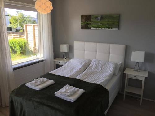 Postel nebo postele na pokoji v ubytování Ubak Guesthouse