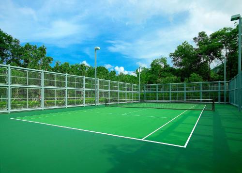 a tennis court with a net on top of it at Hyatt Regency Hong Kong, Sha Tin in Hong Kong