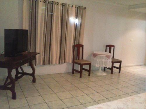 Televisyen dan/atau pusat hiburan di Otellin Triumph Hotel