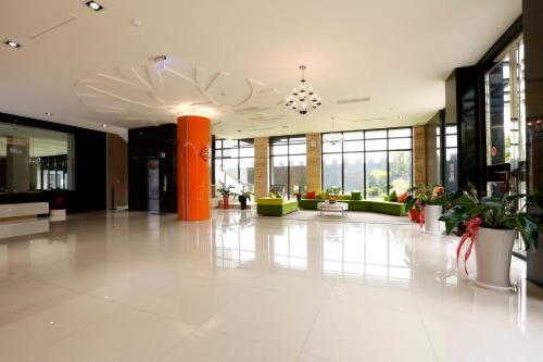 Vstupní hala nebo recepce v ubytování Hua Xiang Hotel-Qishan