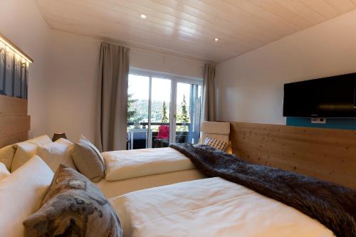 Katil atau katil-katil dalam bilik di Landgasthof Hotel Pröll