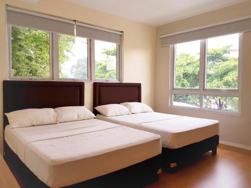 Кровать или кровати в номере The Leaf House