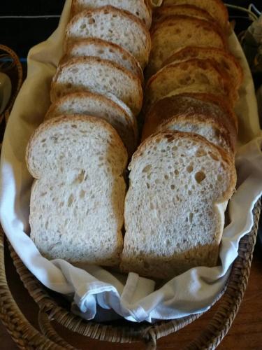a basket with four slices of bread in it at Villa Duangchampa in Chiang Mai