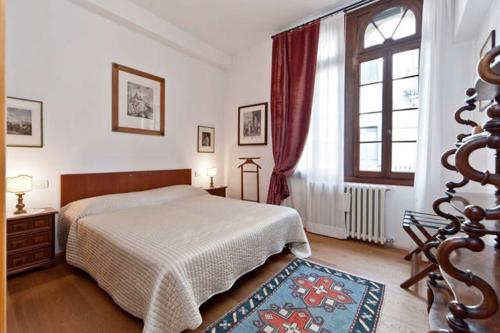 เตียงในห้องที่ Appartamento Accademia San Vio