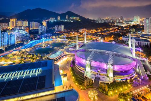 a view of a soccer stadium at night at Olive Tree Hotel Penang in Bayan Lepas