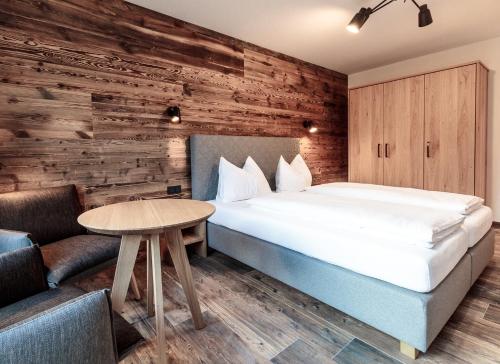 Ένα ή περισσότερα κρεβάτια σε δωμάτιο στο die Schneiderei