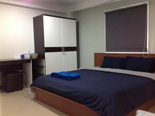 Katil atau katil-katil dalam bilik di Siri Sothorn Apartment