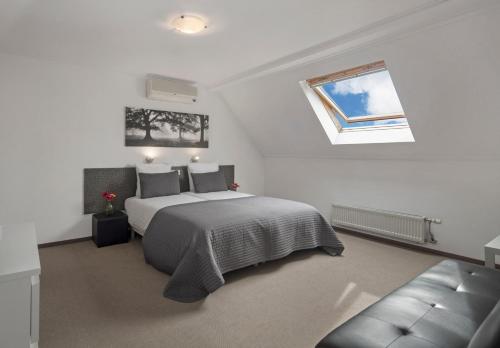 מיטה או מיטות בחדר ב-Wellnesshotel Spabron