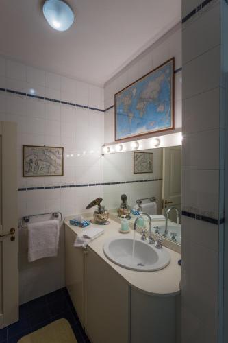 a bathroom with a sink and a mirror at B&B La Stradetta in Bologna