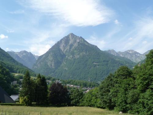 a view of the mountains from a field at Chambres d'Hôtes La Balaguère in Cauterets
