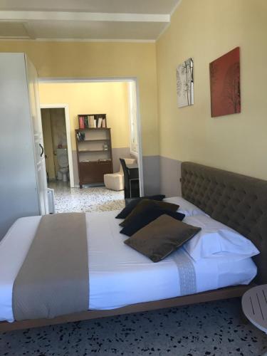 Letto o letti in una camera di B&B Le Colonne