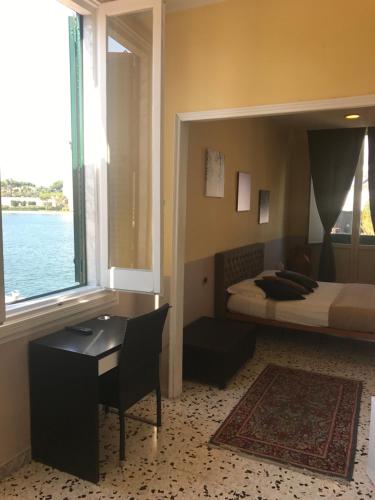 Letto o letti in una camera di B&B Le Colonne