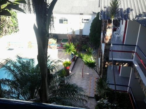 Kolam renang di atau dekat dengan Otellin Triumph Hotel
