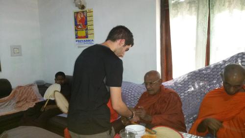 a man standing in front of a group of men at Peacock Residence & Cabana's in Tangalle