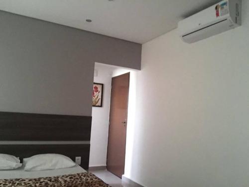 Posteľ alebo postele v izbe v ubytovaní Hotel Guarulhos