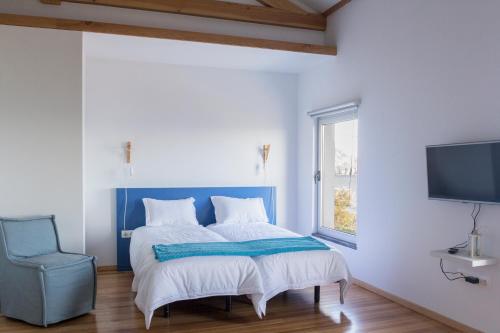 Postel nebo postele na pokoji v ubytování Lofts Azul Pastel
