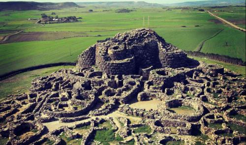 an aerial view of an old castle in a field at B&B Casa Piras IUN3880 in Barùmini