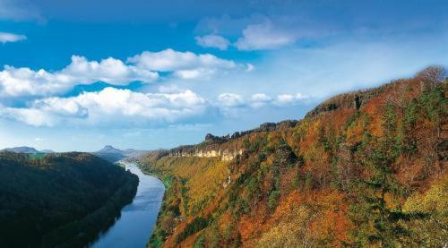 an aerial view of a river on a hill at Panoramahotel Wolfsberg in Bad Schandau