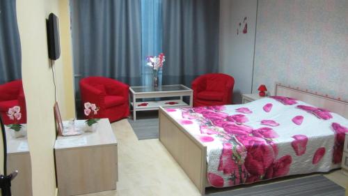 
Кровать или кровати в номере Apartamenty Na Sovetskoy
